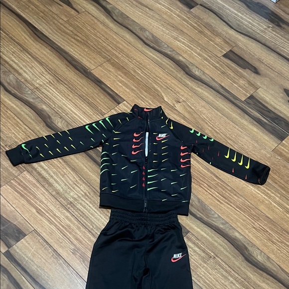 Nike Black Tracksuit with Red, Green and Yellow Accents. - Picture 8 of 9